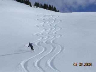 A Ski Addiction guide completing a nice set of tracks